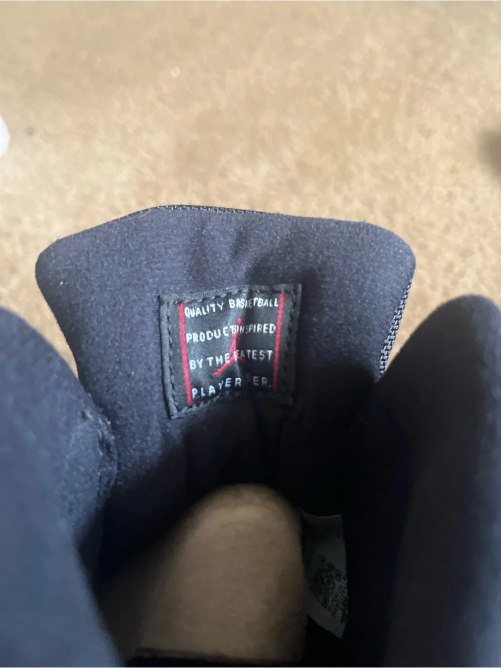 Nike Kids Black Sneakers with Red Soles